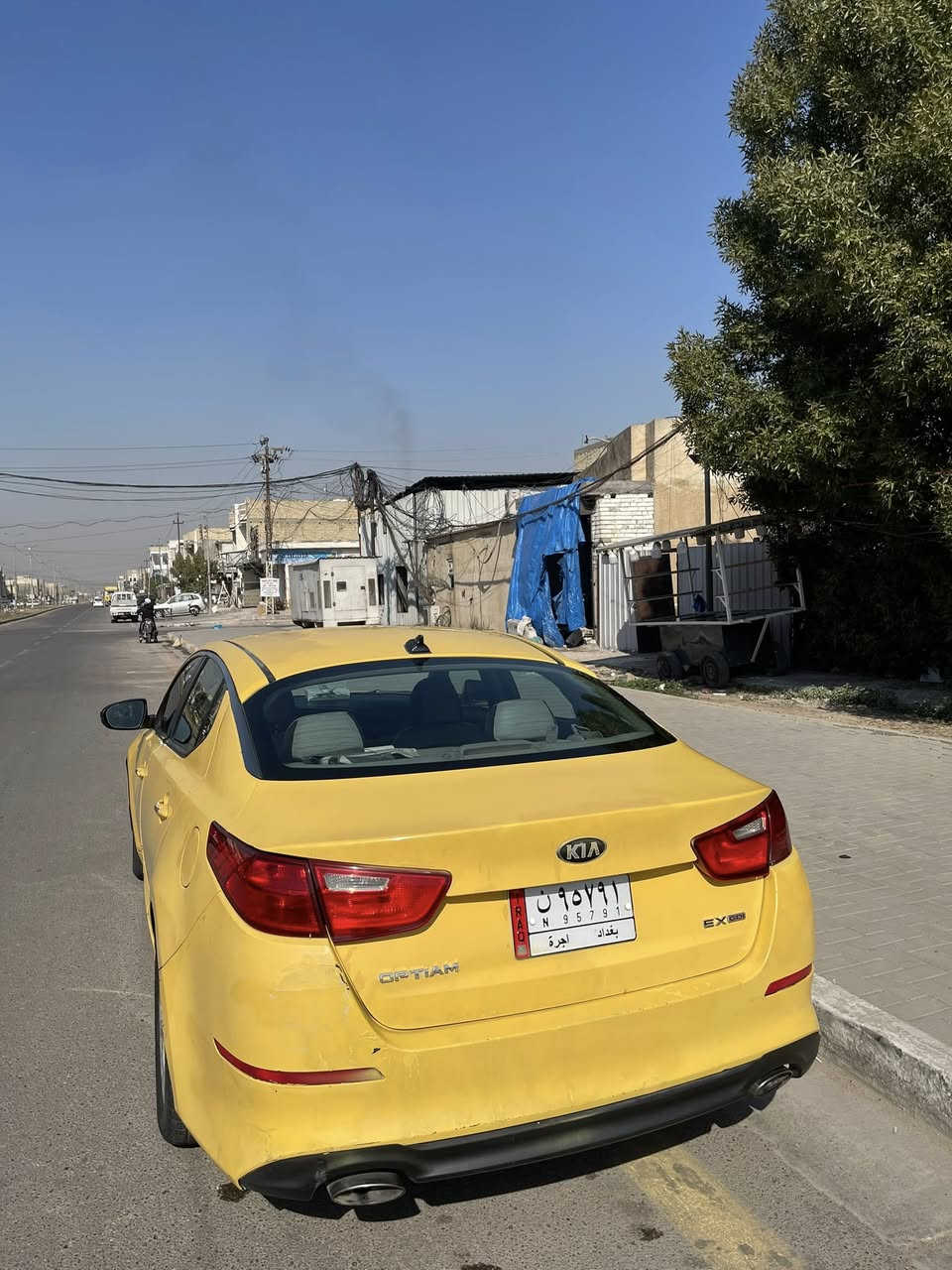 السلام عليكم 
اوبتما 2015 Ex  
رقم بغداد مشروع وطني بأسمي
ماشيه 155 الف وحادثها جاملغ وبنيد و(متچاية)
المواصفات
1. بصمة تشغيل + ابواب + جنطة
2. دبل گزوز
3. دشبول مطعم صاج ملكي
4. قطعتين تبريد
5. كشنات جلد رصاصي
6. كشن السايق كهرباء
7.  تبريد بيانو
8. حساس ايطارات
9. تحكم ستيرن جهتين 
10. محرك 2400
11. اشاير مري
12. مانع انزلاق + Abs
13. نظام ايكو اقتصادي + نظام كروز
14. كير اوتو + عادي
15. بلوتوث + حاكية
16. ويل كب 17
السعر: 88 ورقة 
رقم الهاتف:
***********
