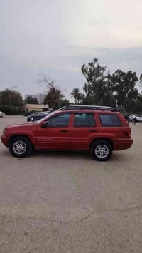 من رخصة صاحب الكروب المحترام للبيع جيب كراند شروكي 2002 رقم سليمانيه 5...