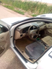 للبيع سني ياباني ٢٠٠٩ بغداد محرك ١٨٠٠ الون ابيض سعر شده ١٠٠ ورقه عنوان...