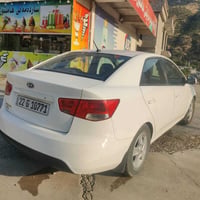 سيراتو • قير عادي • أحمر