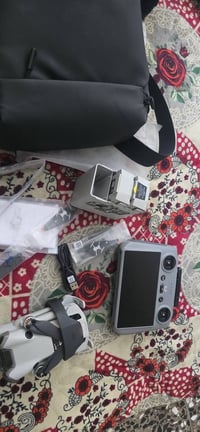 عندي قطعه ميني 4 برو كومبو كلش نضيفه لتواصل07771673634