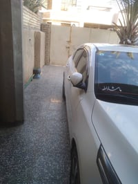 كيا سيراتو ٢٠٢١ لون ابيض رقم بغداد فول موصفات  محرك ١٦٠٠ 07905573293