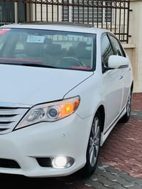 تۆیۆتا ئەڤەلۆن مۆدیل 2012 مانگی 9 قەباخ ڕەش، یەک پەڵەیەک بۆیاخی هەیە ،...