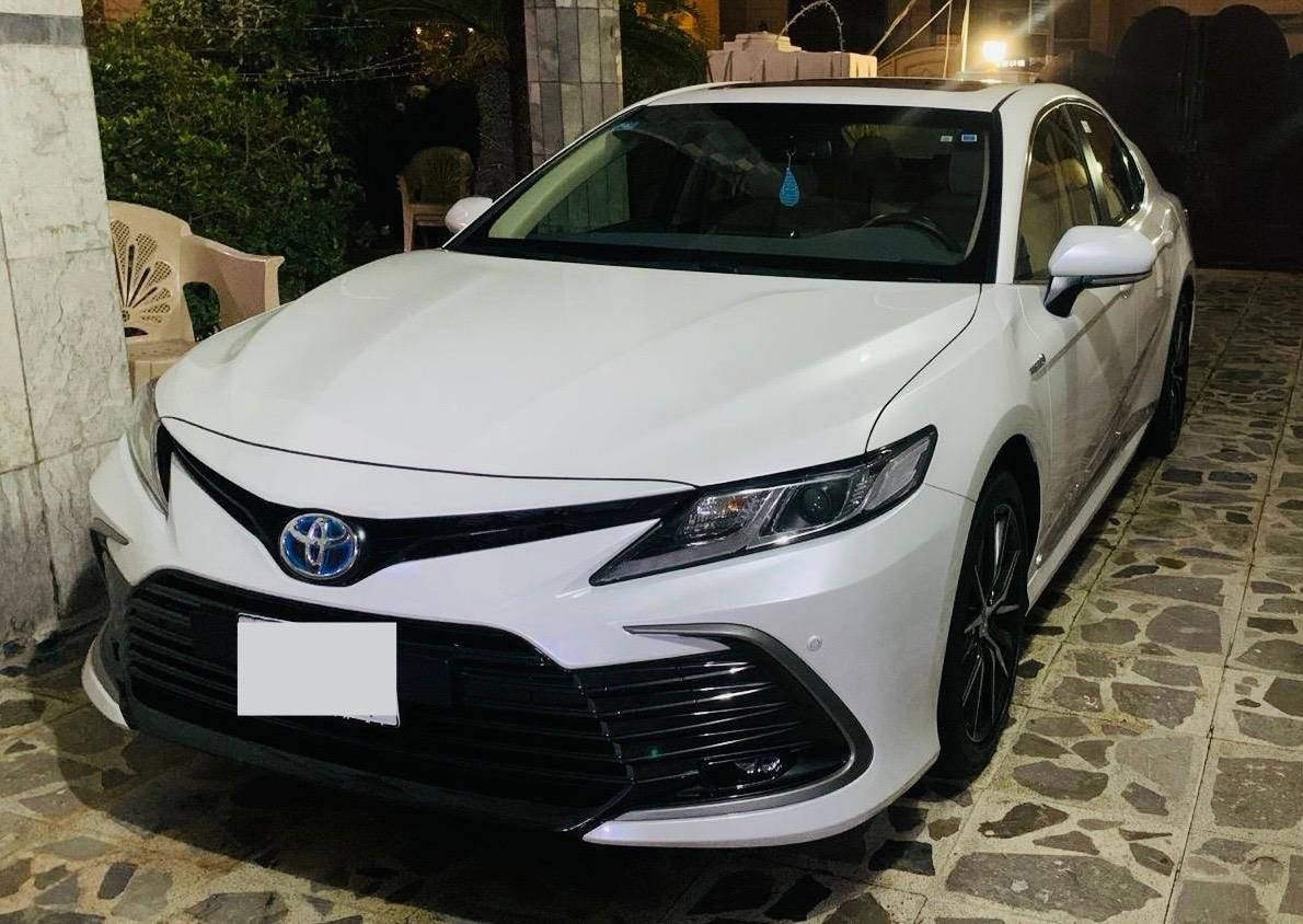كامري هايبرد  2024 وكالة عبدالطيف جميل
ماشية 43 الف 
مواصفات : 
محرك2500
AIR BAG عدد 8
حساسات امامي خلفي 
لايت زينون+ LED 
كشافات
سلايد رووف 
ويل كاب 18 
مفتاح تشغيل بصمة 
شاشة
كاميرة دوارة 
الانارة الداخلية LED
مقعد السائق كهرباء 
مثبت سرعة 
ثلاث مودات قيادة
قطعتين تبريد 
هاند بريك كهرباء 
ABS
اوتو هولد 
اشارة في المرايا الحانبيات قابله للطي كهرباء
مخرج منفذ الطاقة 
بردة خلفية كهرباء 
شاحن هاتف Wireless

رقم بغداد سنوية جديدة لحد 2030 بأسمي 

كير و محرك مكفولات 
السعر 248 $ و بيهة مجال بسيط 
رقم التلفون ***********
مكان السيارة بغداد
