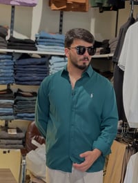 قميص بولو • مقاسات S-XXL • خانقين مول