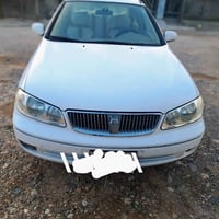 نیسان سەنی 2009 یابانی ئەسڵی گێر ئۆتۆماتیک  قفڵ مەرکەزی  مەکینەی 1.6 س...