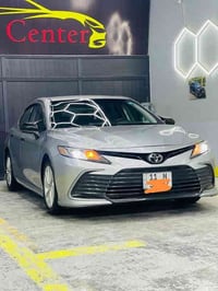 كامري موديل 2023 وارد أمريكي  محرك 2500 كشن كهربا ء رقم بغداد دولي بسم...