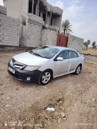 كورلا 2009 محدثة 13 مصبوغة عام جمالية سعر 90 وبيهة مجال07700807433