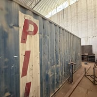 حاوية ٦م • أزرق • نجف الحرفين