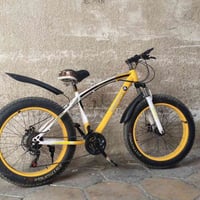 بايسكل دبابة جديد استعمال اسبوعين جديد بعدة يجي دسكات مو بنز  حجم 26 ي...