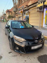 كورلا 2015 لون اسود وارد امريكي  حادثه فقط بنيد دون اي دواخل مثل ما مو...