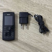 نوكيا X1 • شاحن اصلي • بطارية قديمة