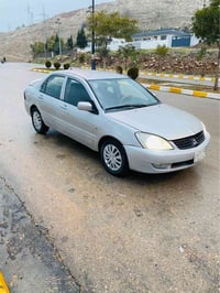 لانسر • ٢٠١١ • اوتوماتيك