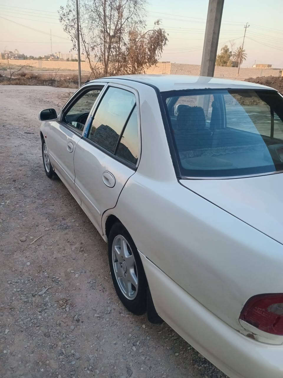 السلام عليكم شباب براتون 2004 كير اتوماتيك البك ما يجي السيارة مصبوغة عام 
السعر ٤٠ وبيهة مجال رقم *********** المكان بغداد بسماية
