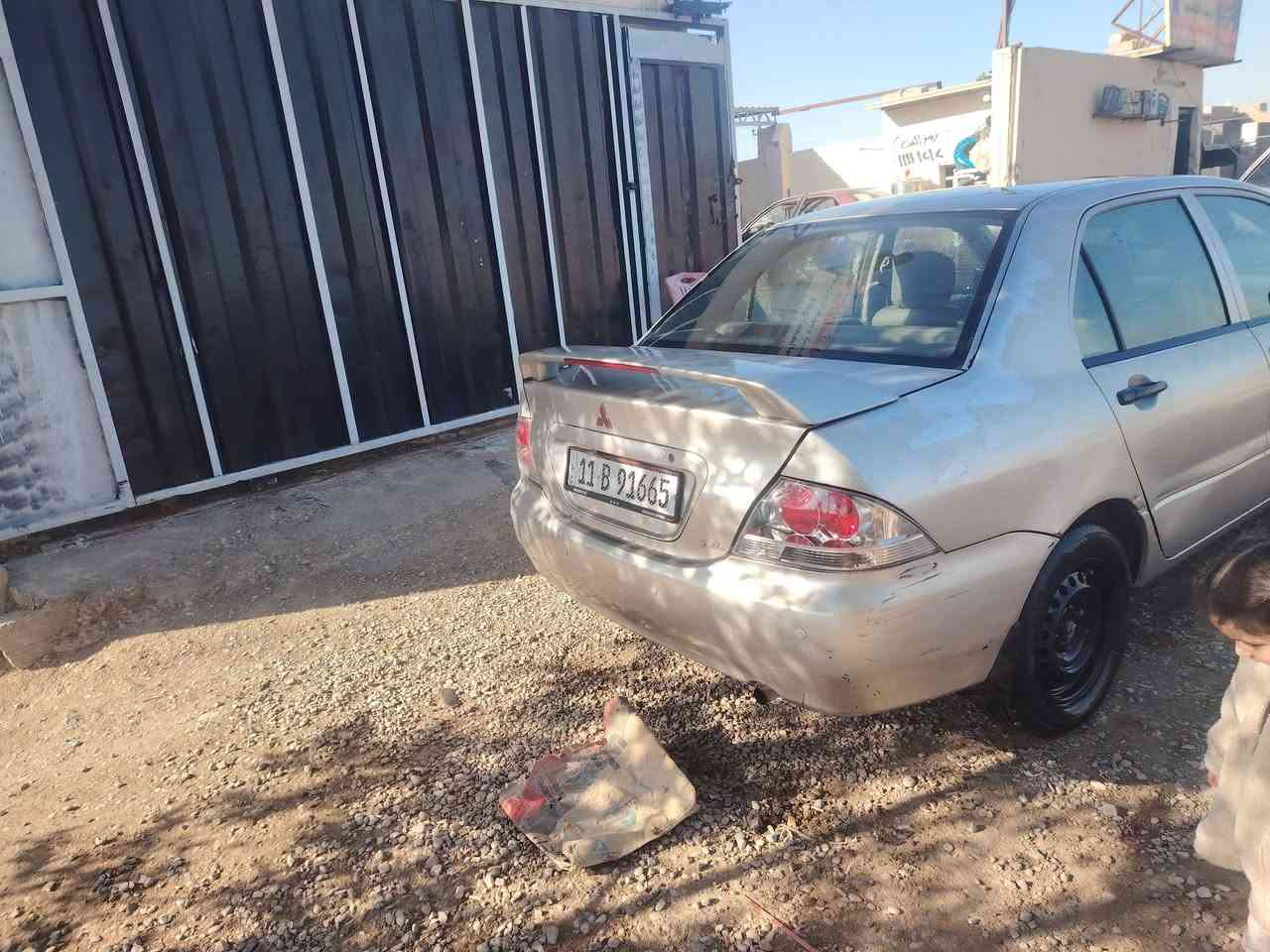 لانسر 2006 جارده باسمي رقم بغداد دولي هزه قبل شهر دخلته  تحويل ثاني يوم بلاديه لاخياس لاضربه فقط دحجة بالباب كهربائيات كله بلاديه بدون اي جطل محرك 1300 اقتصادي جدا تبريد تدفئه كله شغاله بدون اي نقص صدر نص عمر  65 ورقه وبيه مجال بسيط *********** عنوان ديالئ -هبهب
