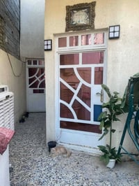 مشتمل طابو زراعي مساحه ١٠٠ متر طابق واحد قرب تقاطع درويش قاعه بغداد لل...