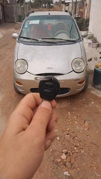 كيو كيو موديل 2010 رقم بغداد انكليزي كله جديد تخم تاير جديد صدر جديد م...