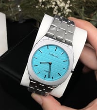 ساعة • أبيض • توصيل