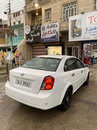 اوبترا 2010 كير اوتو ماتك  واكع عليها سقيفة ومصبوغ عام ابيع هاذا الموج...