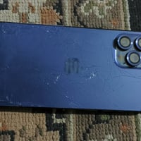 آيفون ١٢ برو ماكس • بطارية ٧٩ • ظهر مكسور