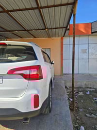 كيا سورينتو 2014  مكينة 6سلندر 3.3 ماشية 115 الف كم   اللون ابيض  7راك...