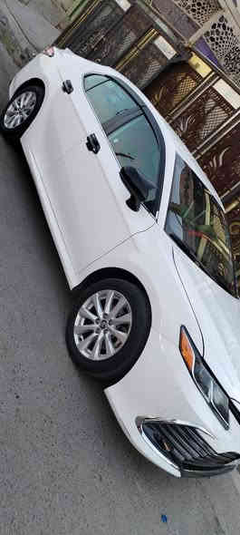 كامري وارد امريكي موديل 2020 رقم بغداد معوقين بعد سنه تصير حره كير محرك مكفولات محرك مامفتوح السونار مرفق بالمنشور مواصفات LE سياره جديده داخل جديد  تبريد ثلج سياره مال جناي *********** /*********** الشراي يتصل مكان السياره بغداد
