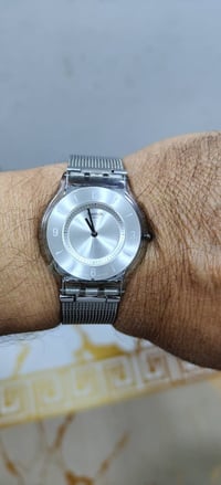 بسم الله الرحمان الرحيم ساعة سواچ سويسري سلم سمك الساعة 4ملم قطرة السا...