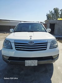 وبركاته  اخوان كيا موهافي 2009 فول مواصفات  بصمه فتحه كامره شاشه وباقي...