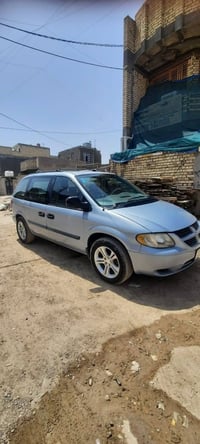 سيارة دوج كرفان ٧ راكب بغداد  للبيع للاستفسار 07906294186