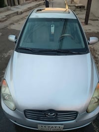 اكسنت ٢٠٠٩ • ١٫٤ اتوماتيك • موصل جانب الأيسر