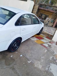 اوبترا موديل 2012 للبيع سياره حلوه رقم بغداد انكليزي مكينه كير صدر مكف...