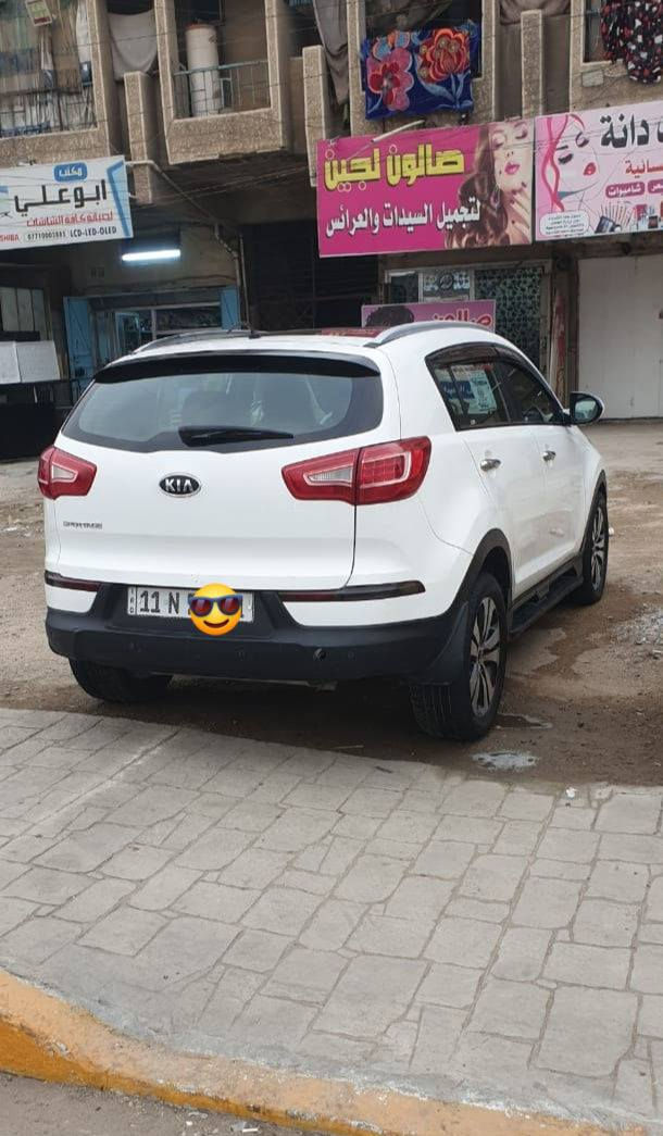 كيا اسبورتج خليجي 2011 فول مواصفات بنرامه رقم بغداد الجديد بسمي محرك دوش المرغوب كير صدر تبريد كامله وبلاديه شاشه كامرا بلاديه وحساسات بلاديه تخم تايرات جديد بجم زنون بيها صبغ قطعتين اثر طخه بسيطه بدون دواخل سعرها 130 وبيها مجال *********** مكان بغداد حي اور
