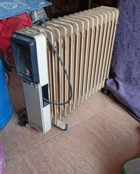 هيتر زيتي • ١٥ شمعه • اوتوماتيك عاطل