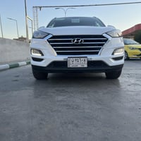 هونداي توسان خليجي موديل ٢٠٢١ رقم بغداد الماني بسمي  لون ابيض  ٤ سلندر...