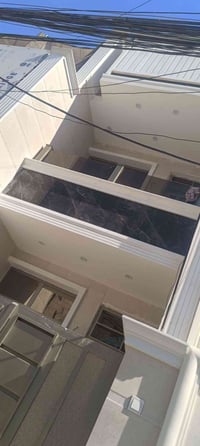 دار 70للبيع /بناء2026 التجار الاولى_ شارع القاضي   07763125288