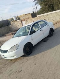 لانسر ٢٠١٣ • قادسيه • تكييف ثلج