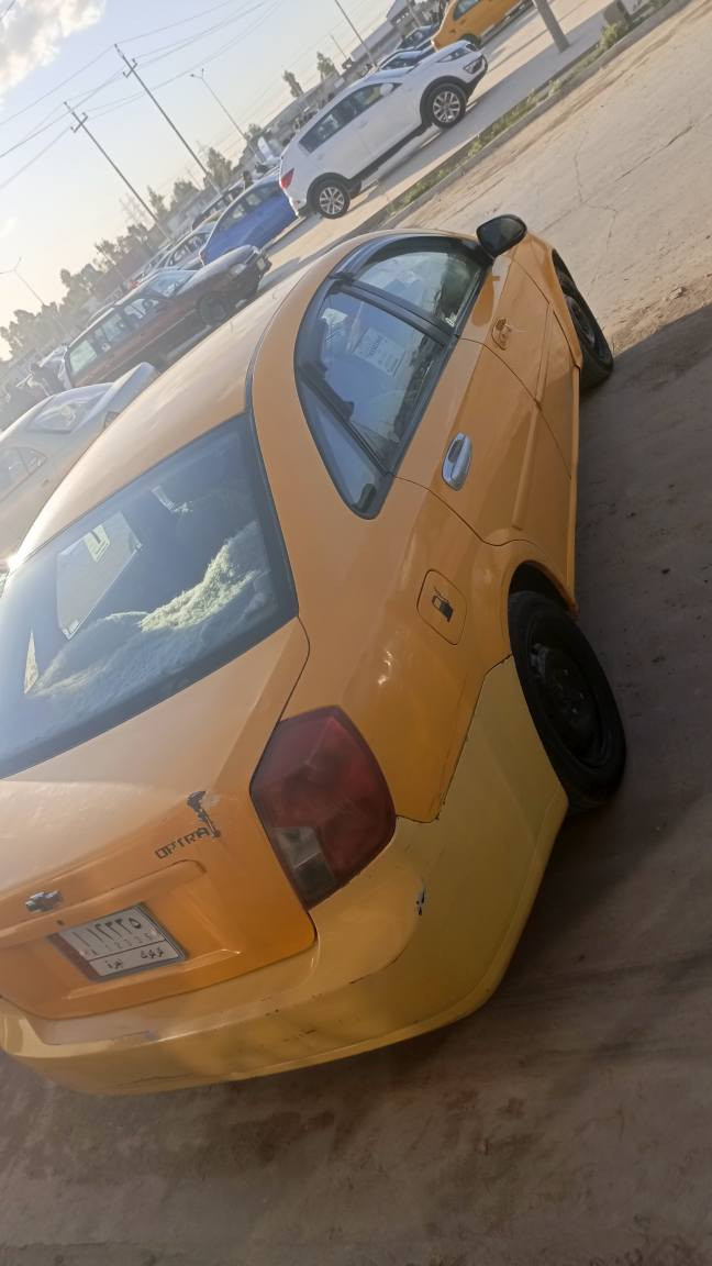 سياره للبيع اوبتره تكسي رقم كركوك سنويه الئ 27 تدفئه تبريد شاشه  سستم سماعات موديل 2005  صدر تايرات كله نضيف دوشمه نضيفه بيه ضربه بل جاملق الخلفي مكان كركوك  بنجا علي *********** كركوك, العراق
