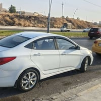اكسنت مضلع • ٢٠١٢ • رقم دهوك