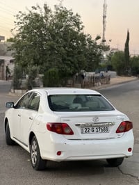 corolla 2008  سپی بۆیاغ ئەستور  مەکینە گەورە  سەنەوی تا ٣١ تەبرید سارد...