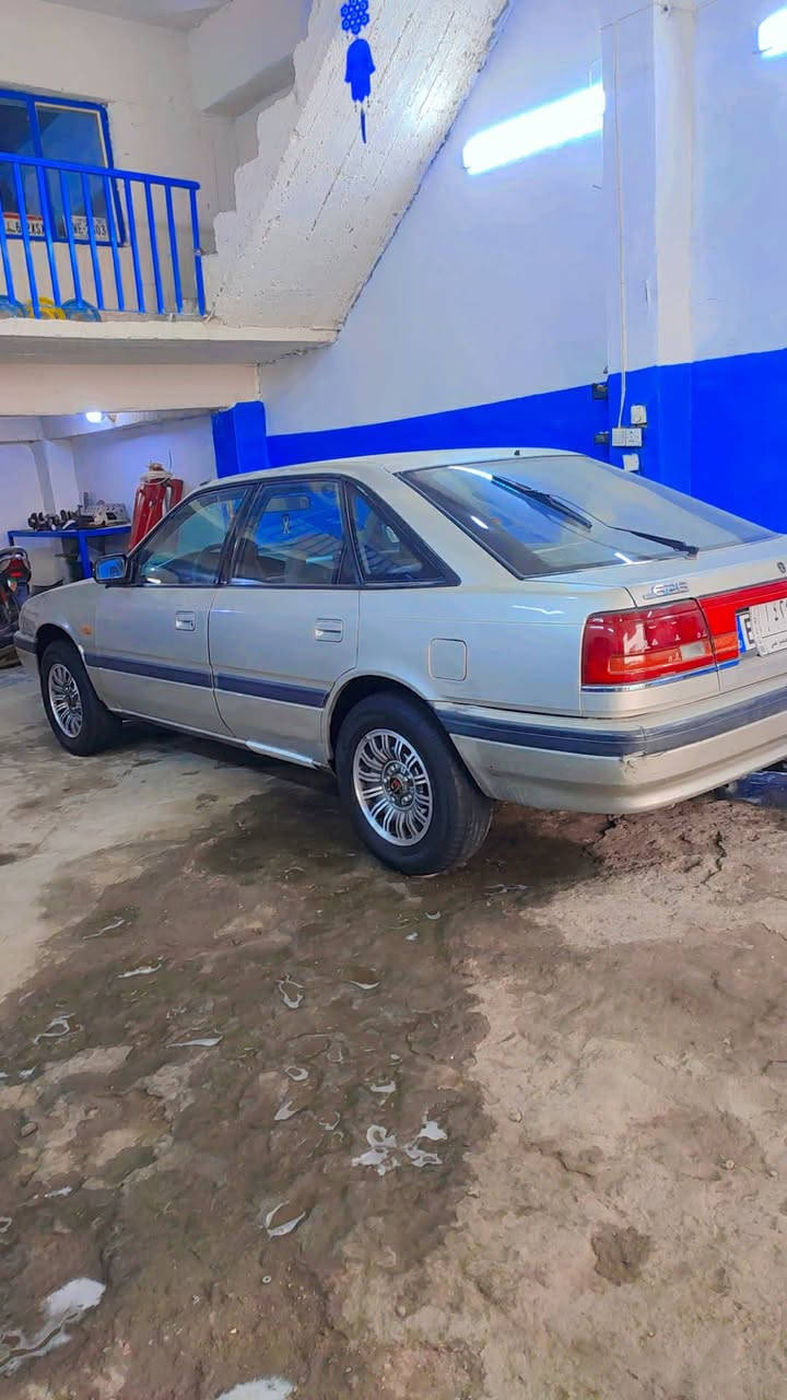 السلام عليكم للبيع مازدا موديل 1991
تبريد شغال تايرات باتري جديد محرك كير شرط درايم شفت ودبل ايمن موزينات وبيها اخياس  الذيول سنويه وهزه لل2029  غرامات صفر وبسمي  رقمها ديالى مشروع وطني السعر 38 مكاني بغداد حي اور الاستفسار ‏‪0771 749 8722‬‏

