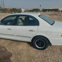 اوبتيما • ٢٠٠٠ • تماتيك