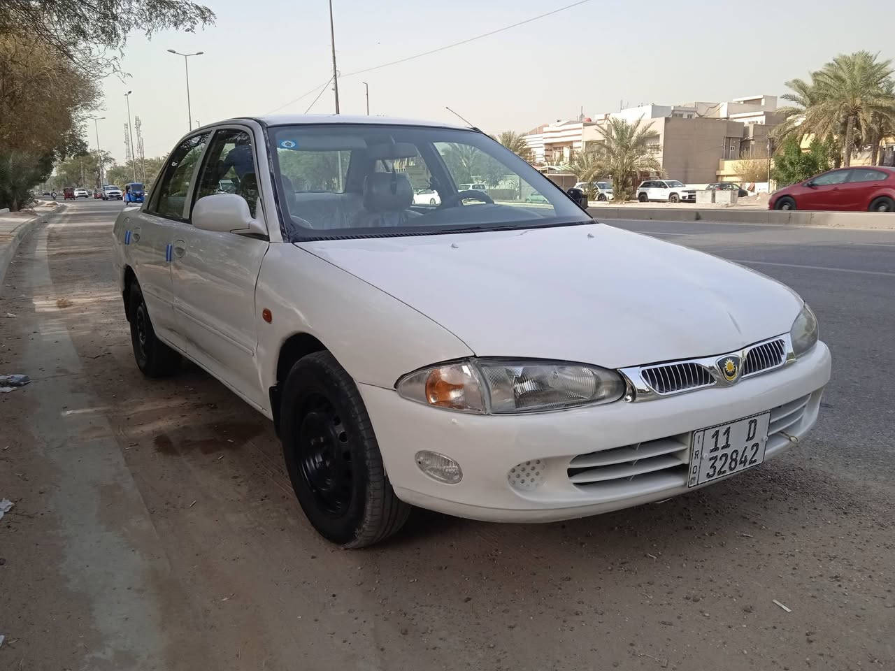 السلام عليكم براتون موديل ٢٠٠٢ بسمي رقم بغداد دولي مكينه كير خير من الله حداديه تبريد شغال كهربائيات شغاله تايرات نضيفه  بيهه مكانات صبغ السياره حلوه ونضيفه مكاني بغداد الكاظميه السعر ٣٨ الهاتف ***********
