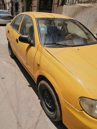 سياره نيسان سني موديل ٢٠٠٤ شخاله مكينه قبغ أسود كهربائيات شخاله صاحبه ...