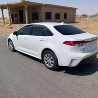 كورلا 2024هايبرد  وارد امريكي مواصفات le رقم بغداد  ماشيه 25 الف ميل ح...