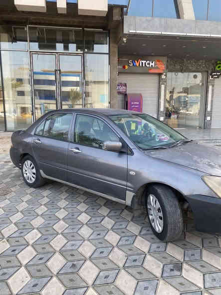 سلام عليكم لانسر ٢٠٠٩ خليجي السيارة مكفولة من كلشي عدة رصعات قليلة وجاملغ جهة السايق كير ومكينة كفالة وجواها تخم تاير وصدر مصار اسبوع من بدلتة وادامة كاملة للسيارة من كلشي وعليها منضومة زنون والسيارة خير من الله السعر ٧٥ وعليها غرامات اني اتحملها فقط المكان بغداد للاستفسار ***********
