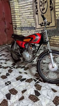 دراجة نارية • نواقص • كوم حديد