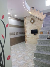 مشتمل الخاجية • ١٠٠م • شارع ١٢م