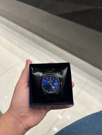 ساعة • اول تم