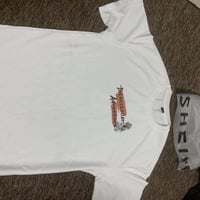 تشيرتات • ملابس