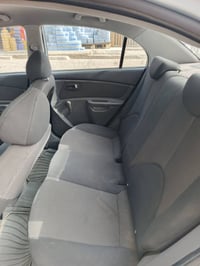 كيا ريو ٢٠٠٧وارد أمريكي حادثه صفحه بدون كص السونر مرفق باسمي كير ومحرك...